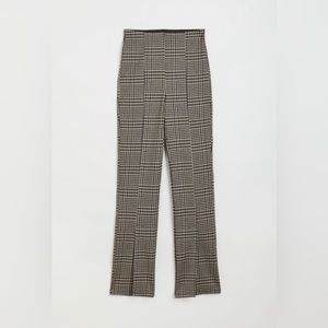 Long flared pants with slits